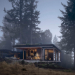 A contemporary residential home with a unique architectural design, featuring a combination of wood and stone materials. The house has large windows that allow natural light to flood the interior, surrounded by a well-maintained garden and trees.