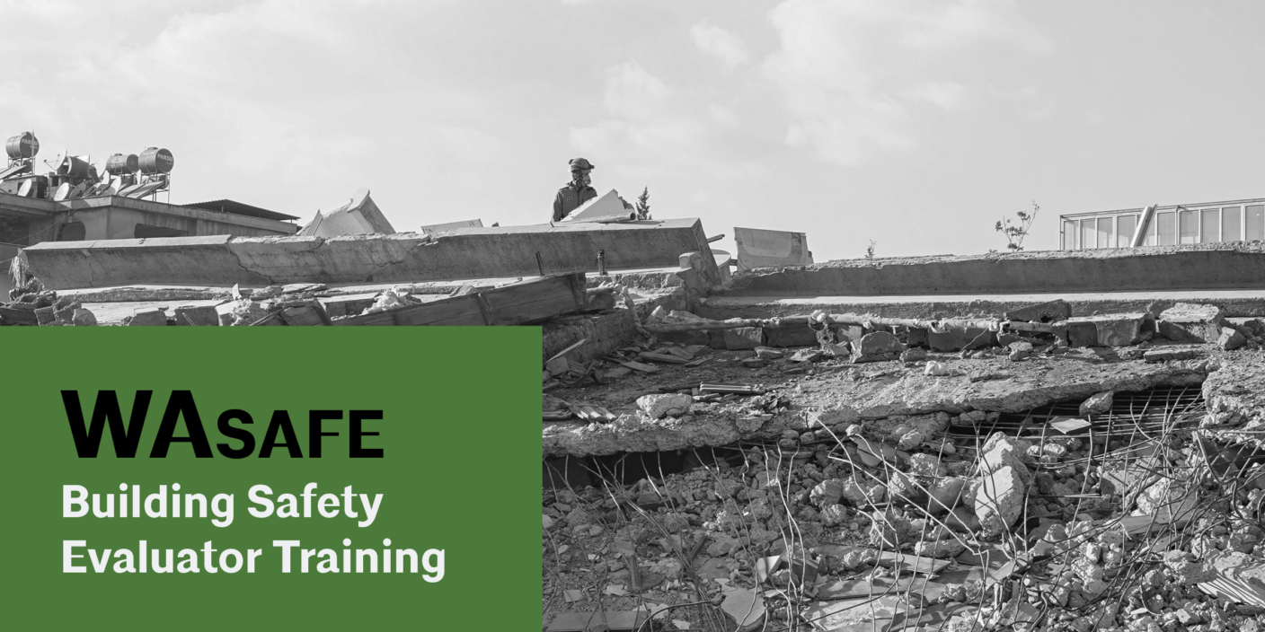 A black and white photograph of a collapsed building with rubble and debris, where a person wearing protective gear stands among the ruins. In the lower-left corner, a green box contains bold black and white text reading 'WASAFE Building Safety Evaluator Training.'