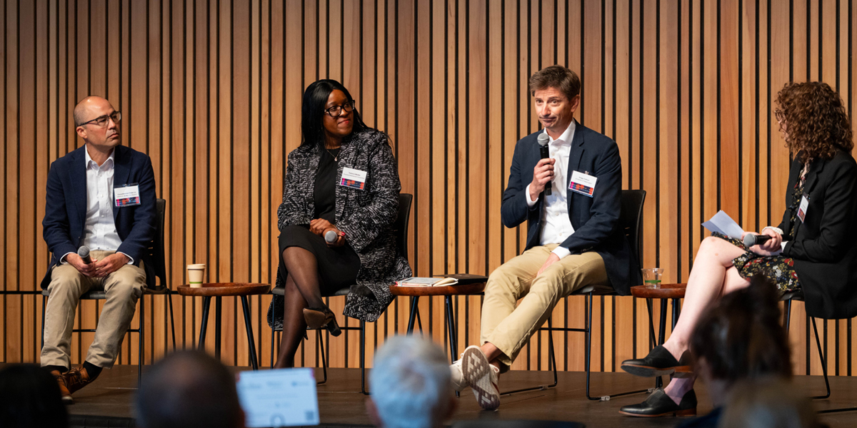 AIA Seattle housing forum panel discussion on stage at the National Nordic Heritage Museum